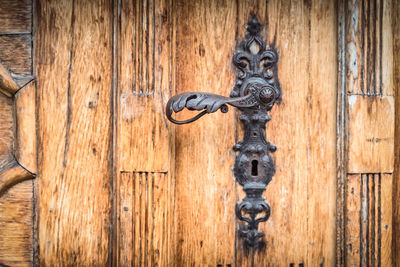 Close-up of closed door knocker