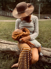 Woman breast feeding portrait 