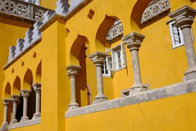 Low angle view of yellow temple