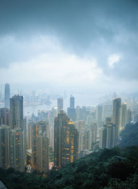 Modern buildings in city against sky