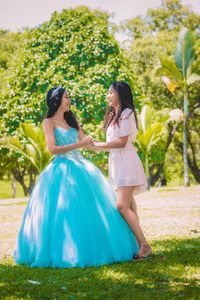 Rear view of bride holding bouquet