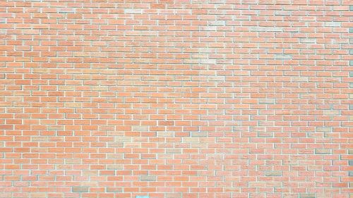 Full frame shot of red brick wall