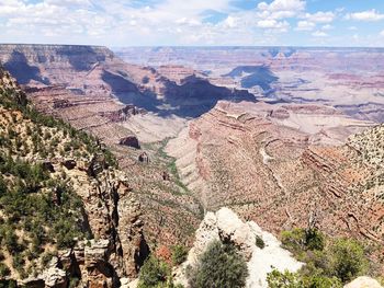 Aerial view of landscape with mountain range in background