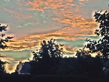 Scenic view of landscape against cloudy sky