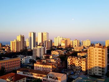 Cityscape against clear sky