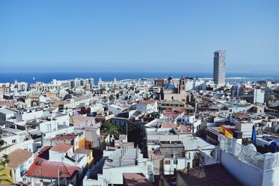 High angle view of cityscape against clear sky