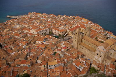High angle view of town by sea