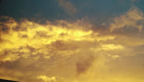 Scenic view of dramatic sky during sunset