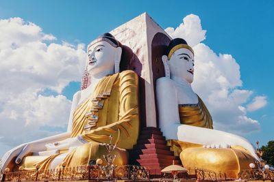 Low angle view of statue against sky