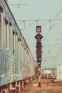 Train on railroad track against sky