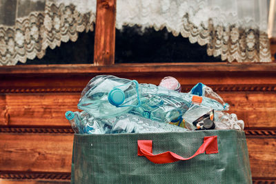 Plastic bottles collected in big container. heap of plastic bottles, cups, bags collected to recycle