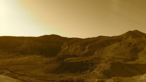 Scenic view of mountains during sunset