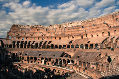 Old ruins of building against cloudy sky