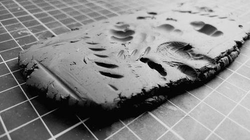 High angle view of wet tiled floor