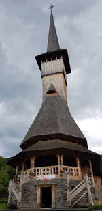 Low angle view of old building against sky