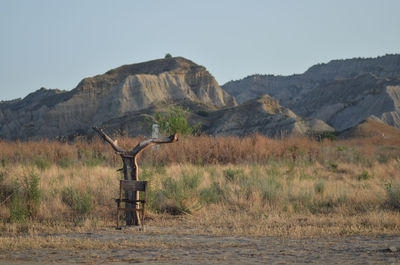 Scenic view of mountain range against clear sky