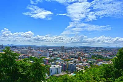 High angle view of townscape against blue sky