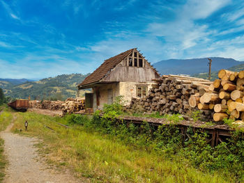 House on field against sky