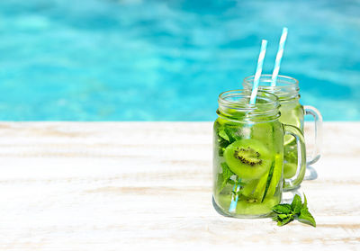 Close-up of drink in glass jar on table