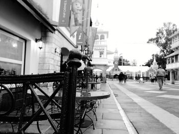 People walking on street in city