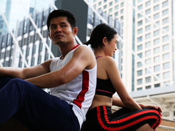 Young men sitting outdoors
