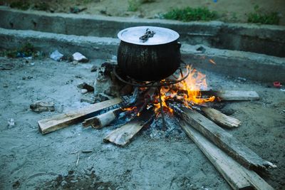 An african method of cooking with firewood and local pot 