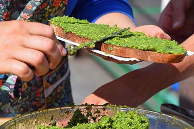 Close-up of man holding food