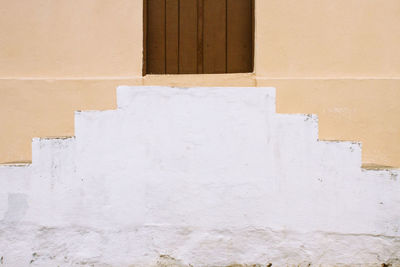 Close-up of wooden window on wall