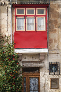 Low angle view of window of old building