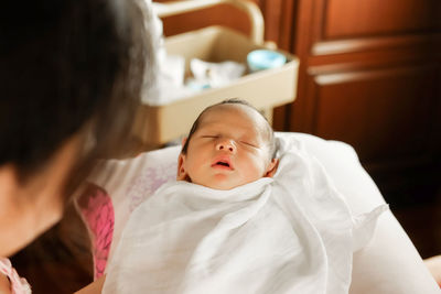Portrait of a mother with baby