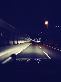 Cars moving on road at night