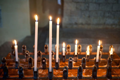 Close-up of illuminated candles