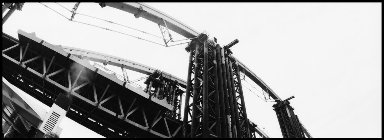 LOW ANGLE VIEW OF BRIDGE AGAINST SKY