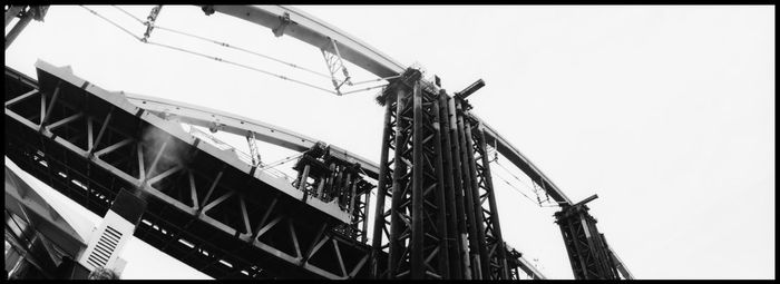 Low angle view of bridge against clear sky