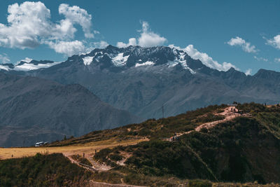 Scenic view of snowcapped mountains against sky