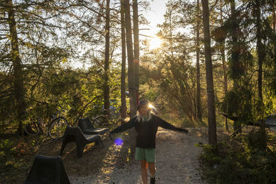 Girl riding bike trip in forest