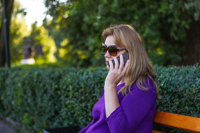 Portrait of woman wearing sunglasses