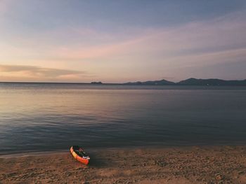 Scenic view of sea against sky at sunset
