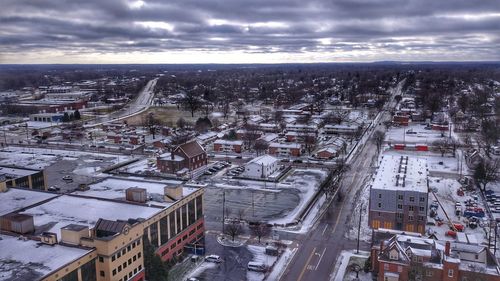 High angle view of street amidst buildings in city