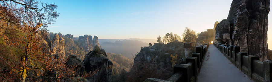 Panoramic view of elevated walkway in mountains