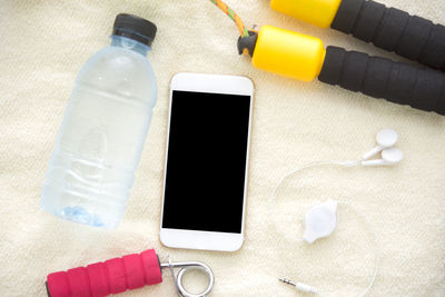 High angle view of mobile phone on table