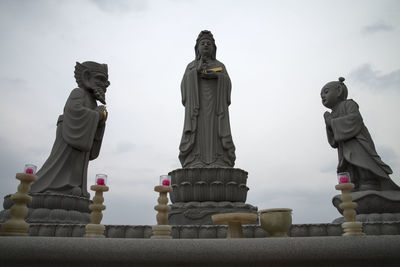 Statue of temple against sky