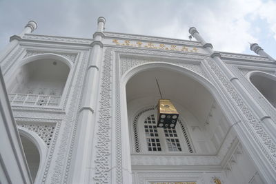 Low angle view of ornate building against sky