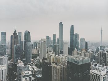 Modern buildings in city against sky