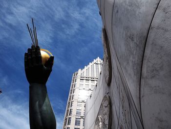Low angle view of skyscrapers against sky