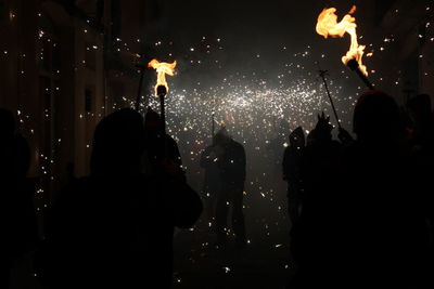 Correfoc parties, typical with firecrackers and lights in the towns