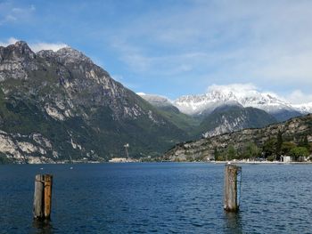 Scenic view of lake and mountains against sky