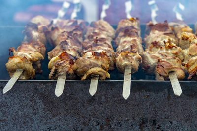 Close-up of meat on barbecue grill