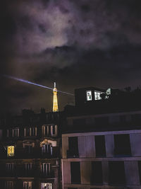 Low angle view of building against sky at night