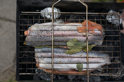Close-up of fish on barbecue grill